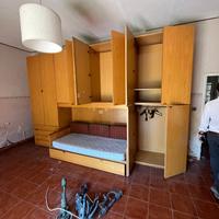 letto con ponte in legno