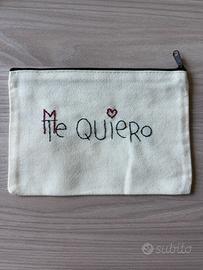 Pochette ricamata a mano