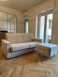 Divano letto 2 posti beige + pouf - nuovo