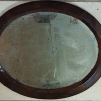 antica cornice lignea ovale