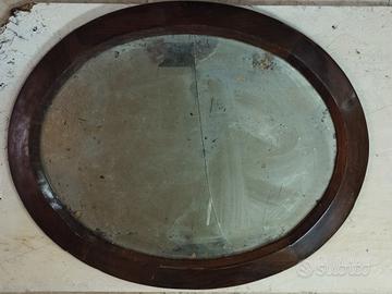 antica cornice lignea ovale