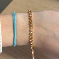 bracciale tennis rosa e oro in acciaio