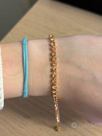 bracciale tennis rosa e oro in acciaio