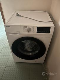 Frigo, divano e lavatrice