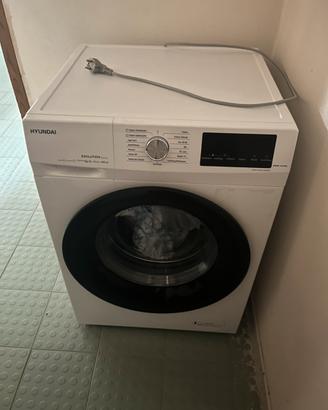 Frigo, divano e lavatrice