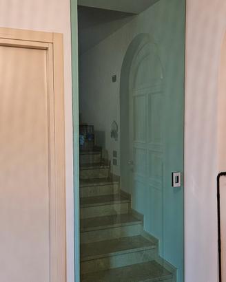 Porta scorrevole in vetro