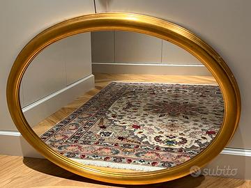 Specchio ovale con cornice oro