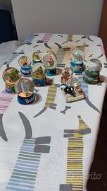 palle di vetro con neve