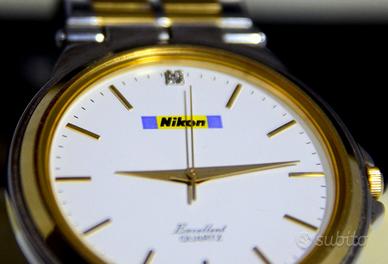Orologio NIKON metallo/oro (rarissimo)