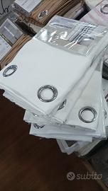 tende coprenti in diversi colori 