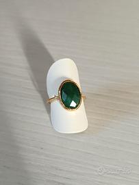 Anello dorato con topazio grezzo