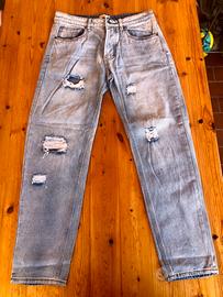 Jeans chiari strappati