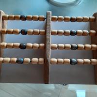 Massaggiatore in legno per piedi