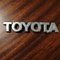 logo auto Toyota metallo