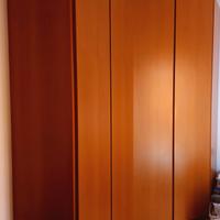 Armadio angolare in Noce Tanganica con Cabina