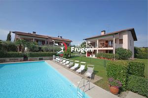 APPARTAMENTO CON VISTA LAGO E DOPPIO POSTO AUTO