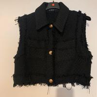 Gilet nero sfilacciato
