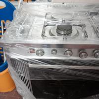 cucina 4 fuochi + forno elettrico € 200