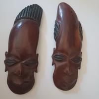 Simbolo uomo donna artigianato maschera africa