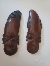 Simbolo uomo donna artigianato maschera africa