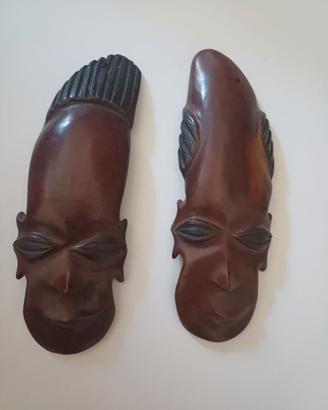 Simbolo uomo donna artigianato maschera africa