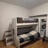 Camera completa con letti a castello a scorrimento