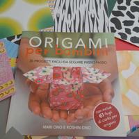 libro e alcuni foglietti circa 30 per origami