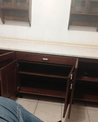 Mobile con tavolo a scomparsa