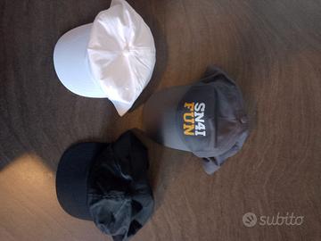 Tre cappelli uomo baseball bianco nero e grigio