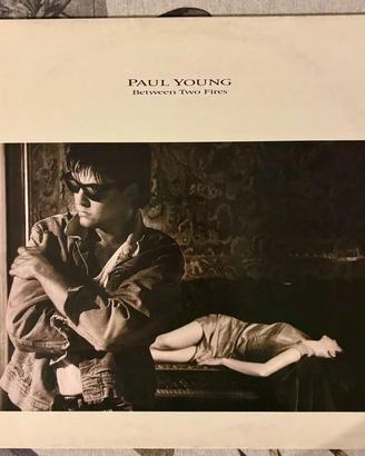 Paul Young - Between Two Fires - LP Vinile 33 giri
