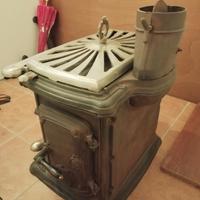 stufa a legna in ghisa d'epoca 
