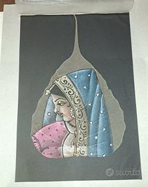 pittura tradizionale indiana di donna su foglia