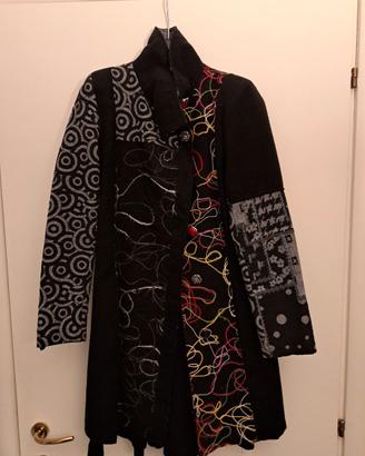 cappotto a tre quarti con diverse texture e fantas