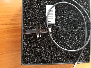 croce in acciaio con girocollo in caucciu'