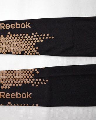 Manicotti compressione Reebok elasticizzati