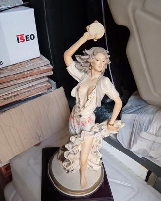 statua 