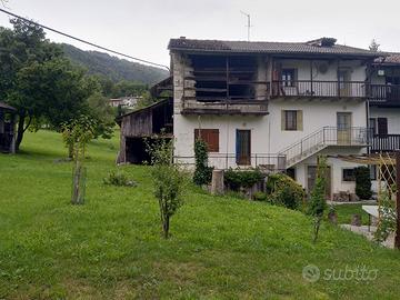 Rustico di testa con terreno