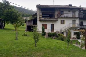 Rustico di testa con terreno