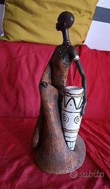 Statuetta di donna , arte africana, scultura creat