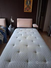 2 letti con testata e bracciolo