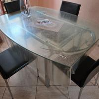 Tavola in cristallo e acciaio 6/8 posti