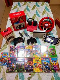Consolle Nintendo Switch OLED completa di accessor