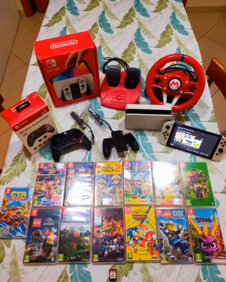 Consolle Nintendo Switch OLED completa di accessor