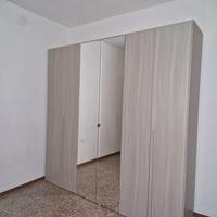 2 armadi 6 ante battenti con specchio centrale