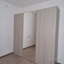 2 armadi 6 ante battenti con specchio centrale