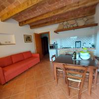 Appartamento con giardino e parcheggio