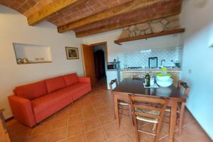 Appartamento con giardino e parcheggio