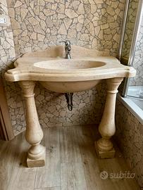 Lavandino in travertino da blocco unico