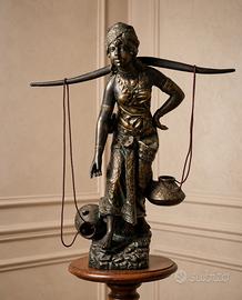 Grande statua vintage portatrice d'acqua
