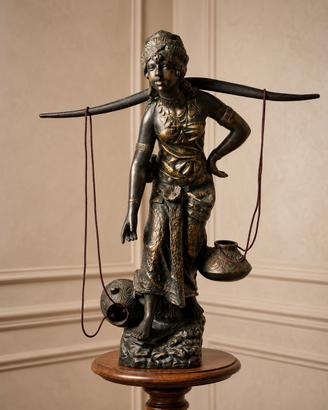 Grande statua vintage portatrice d'acqua